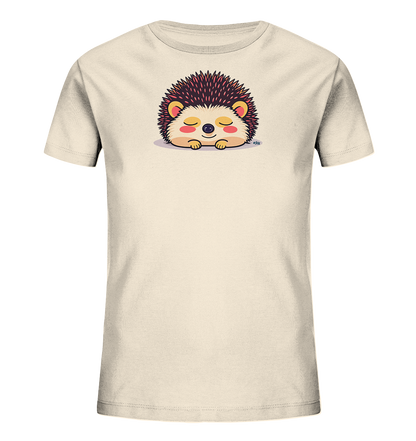 Onlineshop Shirts fuer Kinder - Das Bild zeigt ein hellbeiges Kinder-T-Shirt. Auf der Vorderseite ist ein niedlicher, schlafender Igel abgebildet. Der Igel hat dunkle Stacheln und ein freundliches, friedliches Gesicht mit geschlossenen Augen. Das Design wirkt beruhigend und verspielt, ideal fuer Kinderkleidung.
