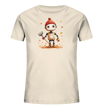 Onlineshop Shirts für Kinder - Das Bild zeigt ein beigefarbenes T-Shirt für Kinder. Auf der Vorderseite ist ein freundlicher, cartoonhafter Roboter abgebildet. Der Roboter trägt eine rote Pudelmütze, hält einen Rechen und steht in einer Szene mit herabfallenden Herbstblättern. Das Motiv hat eine warme Farbpalette und wirkt fröhlich und saisonal, passend für ein herbstliches Kinderdesign.