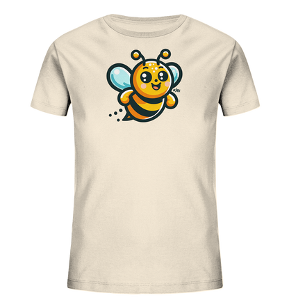 Onlineshop Shirts fuer Kinder - Das Bild zeigt ein cremefarbenes Kinder-T-Shirt mit einem grossen, cartoonhaften Bienenmotiv auf der Vorderseite. Die Biene ist orange und schwarz gestreift mit blauen Fluegeln und hat ein freundliches, lachendes Gesicht. Sie scheint spielerisch zu fliegen, angedeutet durch kleine Punkte hinter ihr. Das Design ist froehlich und farbenfroh gestaltet.