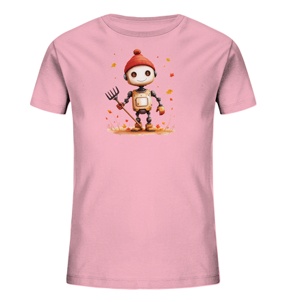 Onlineshop Shirts für Kinder - Das Bild zeigt ein rosafarbenes T-Shirt für Kinder, bedruckt mit einer Illustration eines freundlichen Roboters. Der Roboter trägt eine rote Pudelmütze und hält eine Heugabel in der Hand. Er steht inmitten einer Szene mit fallenden orange-gelben Herbstblättern und herbstlichem Gras auf braunem Grund. Die gesamte Grafik ist im niedlichen Cartoon-Stil gehalten und erzeugt eine warme, herbstliche Atmosphäre.