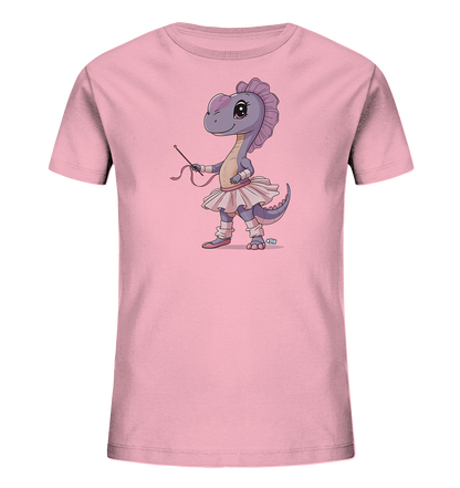 Onlineshop Shirts fuer Kinder - Dieses hellrosa Kinder T-Shirt zeigt eine suesse Cartoon-Illustration eines lila Dinosauriers. Der Dinosaurier ist als Ballerina gekleidet, traegt ein Tutu, Ballett-Schuhe und haelt einen Zauberstab. Die Figur hat grosse, freundliche Augen und steht in einer taenzerischen Pose. Dieses Motiv verleiht dem Shirt einen verspielten Look.