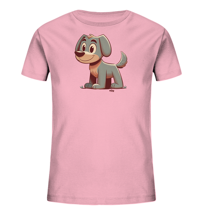 Onlineshop Shirts fuer Kinder - Das Bild zeigt ein Kinder-T-Shirt in hellem Rosa. Auf der Vorderseite ist eine niedliche, cartoonartige Illustration eines Hundes zu sehen. Der Hund hat graues Fell, sitzt aufrecht und laechelt freundlich, ergaenzt durch eine kleine Rasenflaeche. Das Design wirkt froehlich und ansprechend fuer Kinderkleidung.