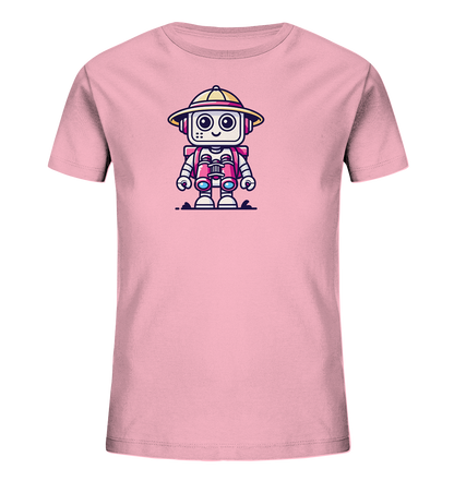 Onlineshop Shirts für Kinder - Das Bild zeigt ein hellrosa Kinder-T-Shirt. Auf der Vorderseite ist eine Illustration eines niedlichen, cartoonhaften Roboters zu sehen. Der Roboter trägt einen Safari-Hut und hat ein Fernglas um den Hals. Er hat große Augen und ein freundliches Lächeln, was ihm ein verspieltes Aussehen verleiht.