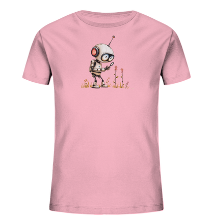 Onlineshop Shirts für Kinder - Das Bild zeigt ein hellrosa Kinder-T-Shirt. Auf der Vorderseite ist eine detaillierte Grafik eines kleinen Roboters zu sehen. Der Roboter hält eine Lupe und scheint Blumen und Grashalme auf dem Boden zu untersuchen. Das Design vermittelt eine neugierige und wissenschaftliche Stimmung und ist ideal für junge Entdecker.