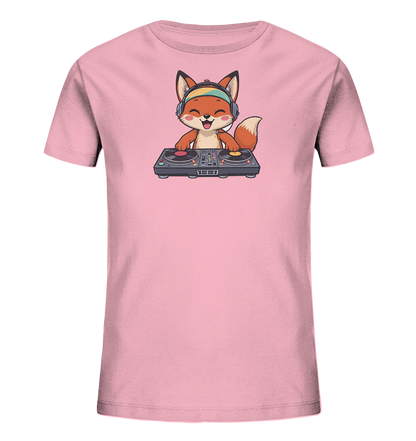 Onlineshop Shirts fuer Kinder - Das Bild zeigt ein rosafarbenes Kinder-T-Shirt mit einem niedlichen Cartoon-Fuchs. Der Fuchs traegt bunte Kopfhoerer und bedient ein DJ-Pult, wobei er einen froehlichen Gesichtsausdruck zeigt. Das Design ist farbenfroh und verspielt, ideal fuer kleine Musikliebhaber. Es verleiht dem T-Shirt einen lustigen und energiegeladenen Charakter.