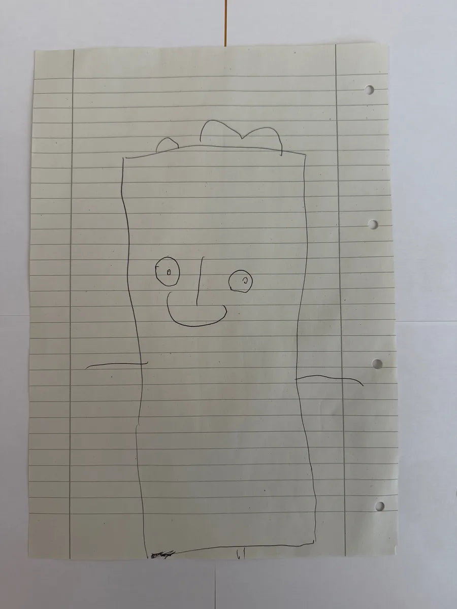 Kinderzeichnung auf liniertem Papier